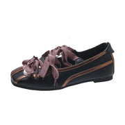 Mary Jane Ballet Flats in black and purple, round toe, low heel with lace-up design, featuring a silver metal charm.