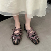 Mary Jane Ballet Flats Round Toe Low Heel Black Purple Lace-up with Silver Metal Charm worn with a light dress