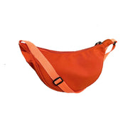 Women's bag - A round-shaped nylon bag with a cross-body strap, suitable for traveling, going to school or shopping.